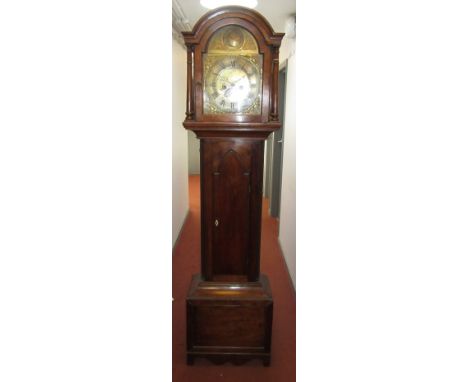 A mahogany eight day longcase clock signed R.Sampson St Columbe, early 19th century, the arched brass dial decorated with a b