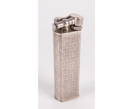 A Dunhill Unique Paris silver gas lighter, height 64mm, with fabric textured finish.