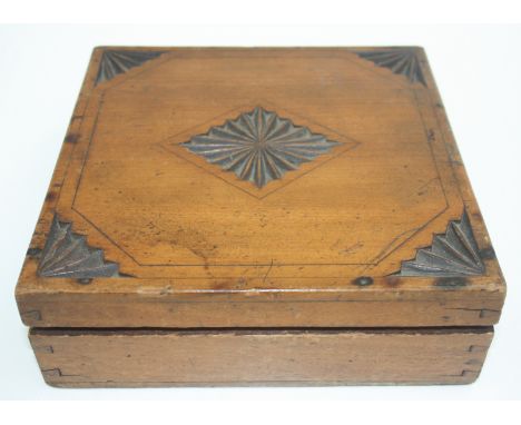 A walnut silk lined work box, early 20th century, decorated beneath the lid with the portrait of a sailor and inscribed 'Inte