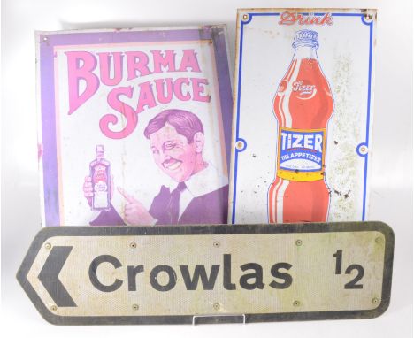 Two enamel advertising signs, Burma Sauce, 60.5 x 45.5cm, Tizer, 61 x 30.4cm and a Crowlas road sign, 20 x 73.5cm. 