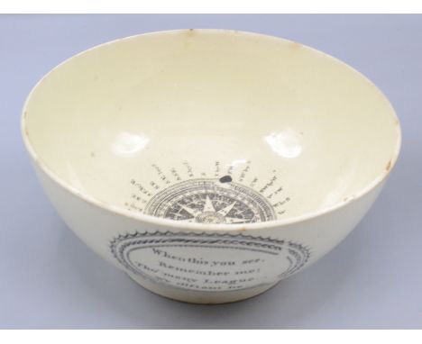 A maritime creamware bowl, early 19th century, with transfer printed decoration of a compass to the centre, the exterior insc