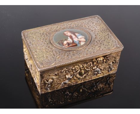 A mid 19th century continental silver gilt and enamel singing bird automaton music box, the top with foliate strap work in lo