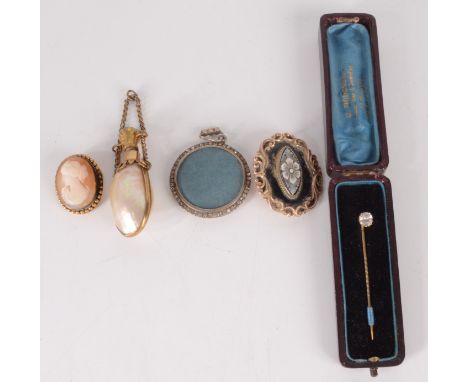 A shell and gilt metal mounted perfume bottle, a cameo brooch, a stick pin, a Victorian brooch and a pendant locket.