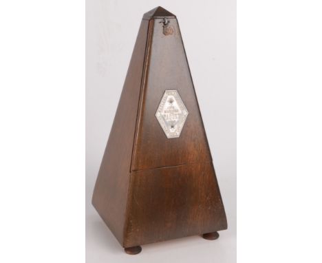A French mahogany metronome, with metal plaque inscribed '1815 MAELZEL PAQUET 1846', height 23cm. 