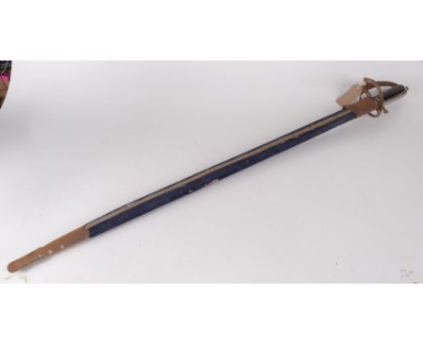 An Indian dress sword, the 77cm blade with foliate decoration, wire bound black leather grip and metal guard, velvet covered 