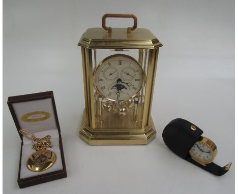 A contemporary Sewills New Millennium mantel clock, height 20cm, an alarm clock and a pocket watch. 