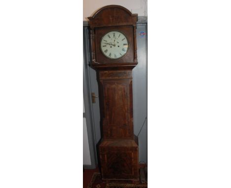 A George III mahogany eight day longcase clock, the 30.5cm diameter painted dial flanked by a pair of turned columns on brack