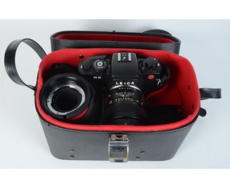 A Leica R5 camera, No.1788173, Leitz Wetzlar, Macro-Elmarit-R, with accessories in a fitted case.