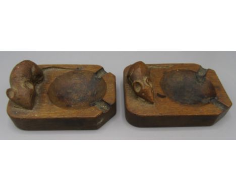 A Robert 'Mouseman' Thompson carved oak ashtray, length 10.5cm, width 7.5cm, together with another similar.   Condition repor