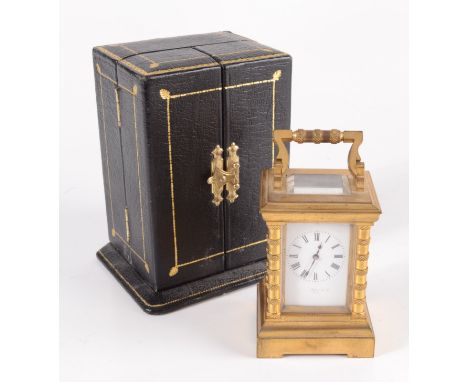 A miniature brass carriage clock, the white enamel dial inscribed Hall & Co, the movement signed 'G.L 2241', in a black leath