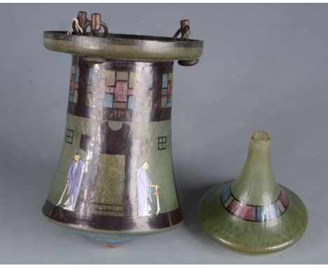 A coloured glass hanging lantern, early 20th century, with grotesque figures either side of a doorway, height 27cm.