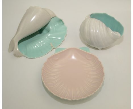 Three Poole pottery shell form dishes. 