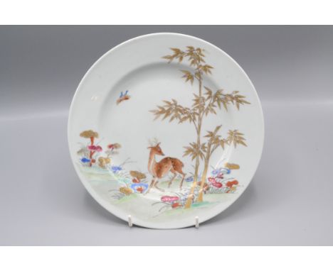 A Chinese export porcelain plate, 18th century, gilt decorated with a deer amongst foliage, diameter 23cm.   Condition report