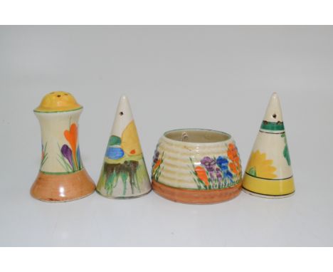 A Clarice Cliff Bizarre Crocus pattern salt cellar and jar, height of cellar 8cm, diameter of jar 7cm and a salt and pepper p