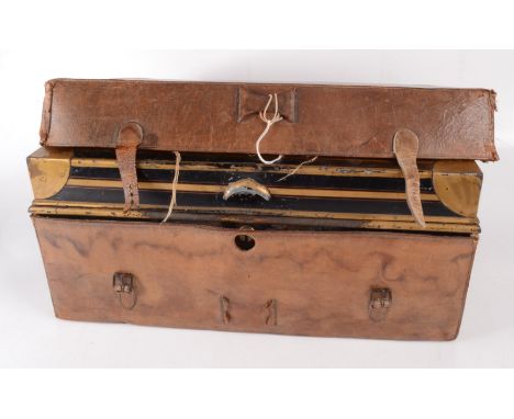A brown leather covered military campaign tin document case, late 19th century, initialled C.T.R. to the cover, the green pai