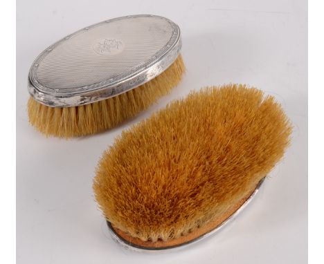 A pair of engine turned silver brushes, Birmingham 1906, 13 x 7.2cm.