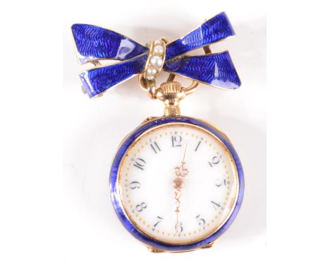 An 18ct gold small fob watch with matching bow brooch the back of the case set with a diamond flower the whole blue enamelled