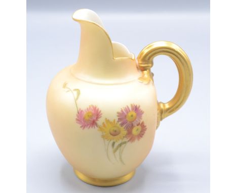 A Royal Worcester blush ivory jug, with floral decoration and fluted gilt handle, RD No.29115 also inscribed 1094, height 13c