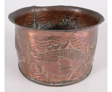 A copper planter repousse decorated with stylised fish, height 10.5cm, diameter 18cm. 