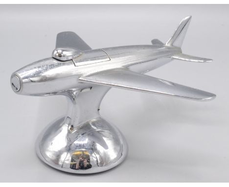 A Dunhill chrome table lighter in the form of an aeroplane, REG. DES. NO.872899, height 8.5cm, length 16cm, width 15cm. 