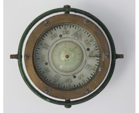 A brass and green painted ship's compass, total diameter 17cm.