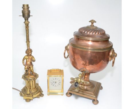 A copper tea urn, 19th century, with brass tap, height 39cm, width 24cm, a gilt metal lamp base, height 45.5cm and a modern b