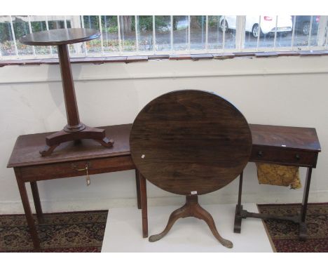 A George III mahogany tripod table, the circular hinged top on a ring turned stem and cabriole supports with pad feet, height