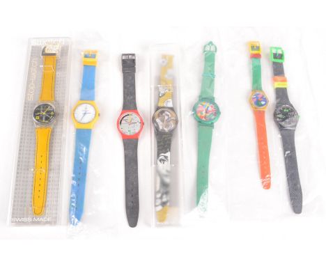A Swatch Fornasetti watch (new, boxed), together with other Swatch and Swatch type watches. 