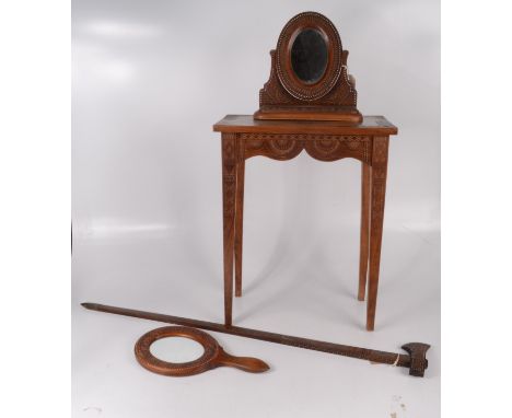 A Ukrainian chip carved and bead inlaid small table, a similar small dressing table mirror, a hand mirror and a walking stick