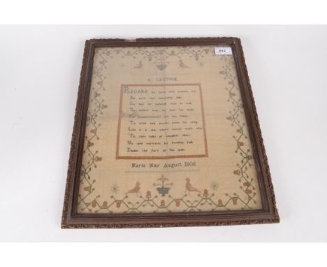 A George III woolwork sampler by Maria May August 1801, entitled 'A Caution, REGARD the world with cautious eye, Nor raise yo
