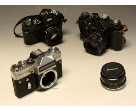 Photographic Equipment - a Zenit TTL SLR camera and case; a Zenit EM camera; a Pentax ProgramA camera; a Praktica carrying ca