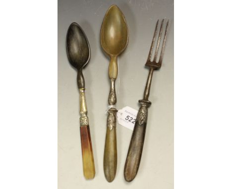 An 18th century horn spoon, silver coloured metal mount; another similar; a steel three prong fork with horn haft, metal moun