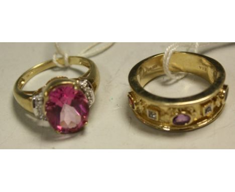 A 9ct gold pink topaz and diamond chip ring, 4.5g; a 9ct gold diamond, sapphire, amethyst and garnet dress ring, 6.9g (2)