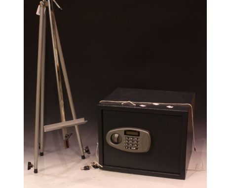 A digital safe, with keys; a folding artists easel (2)