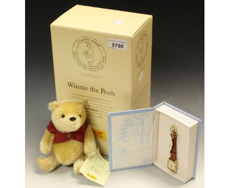 A Steiff Winnie the Pooh bear, limited edition 75th Anniversary, boxed with label and paperwork; a Winnie the Pooh Timex wris