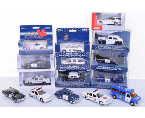 Fifteen Canadian Mounted Police models,including Shuco Saab K-9 unit, 4 x RCMP Heritage Collection, Elite Chevrolet Suburban,
