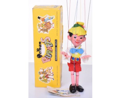 Pelham Puppet Pinocchio in near mint condition, with a excellent original box with slight age wear, plus a original Pelham Pu