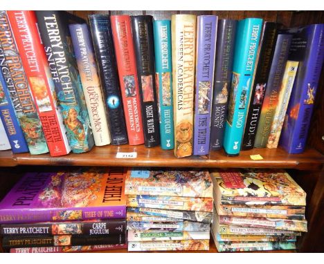 Terry Pratchett.  Jingo, A Hat full of Sky, The Truth and eighteen further hardback novels, some first editions, with dust co