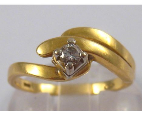 A yellow metal (tests 18 carat gold) diamond solitaire ring, size O, 3.9 gms.