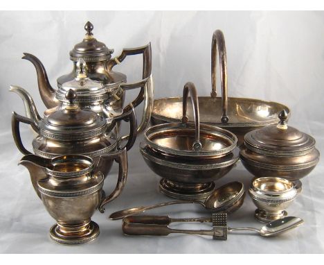 A comprehensive Russian silver tea equipage, comprising a seven piece tea set, urn shaped with Greek key girdle and rims , co