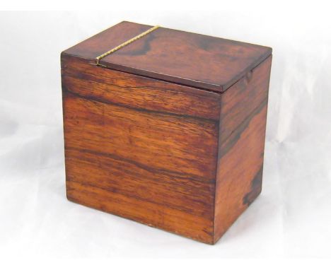A Regency rosewood tea caddy with original foil lining and hinged lid. 14x9x13cm. high. 
