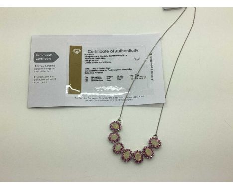 The Genuine Gemstone Company Ltd; A Rhodolite Garnet and Opal "925" Cluster Necklace, on fine chain, complete with Certificat