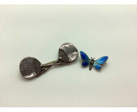 A Chinese Fan Brooch, together with a dainty enamel butterfly brooch, highlighted in blue. (2) [2082480]