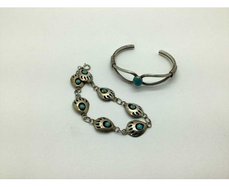A Modernist Style Bracelet, of stylised design with inset highlights; together with an openwork bangle, oval cabochon collet 