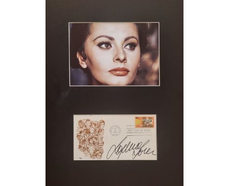 Sophia Loren Italian Actress Signed First Day Cover With Mounted 11x15 Inch Colour Photo Display. Good condition. All autogra