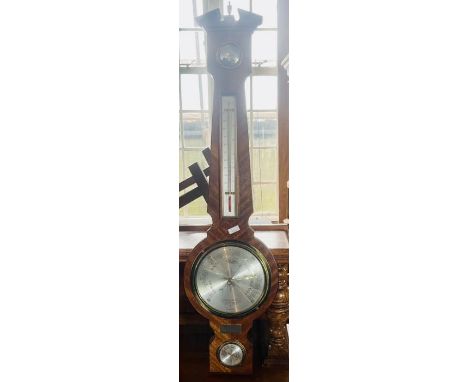 A Comitti of London mahogany banjo barometer.