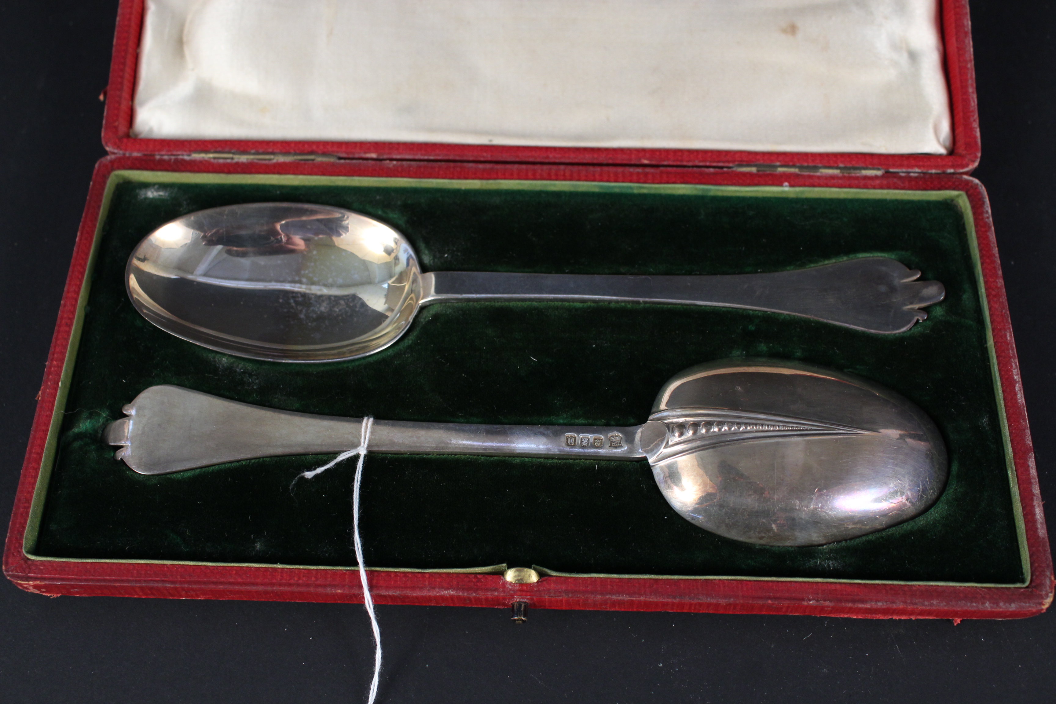 A cased pair of Britannia silver spoons, hallmarked London 1908, maker