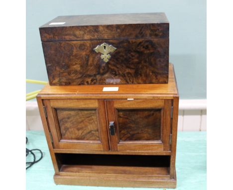 A 19th Century walnut two compartment tea caddy plus a mahogany and walnut two door table cabinet