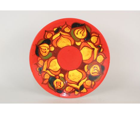 A Poole fruit decorated charger, dia 16"