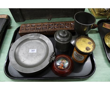 A vintage continental carved wooden wash paddle, three pieces of 19th Century pewter including a tobacco jar and other items